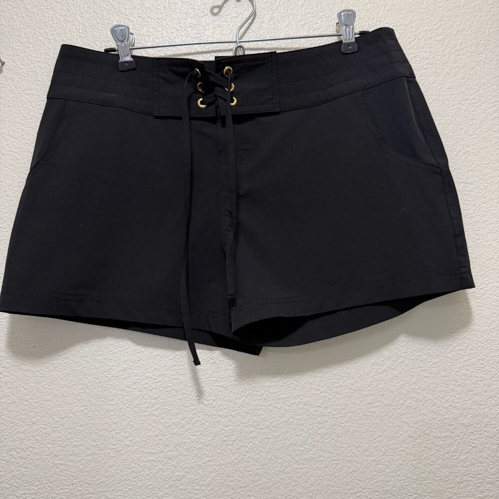 La Blanca woman's black swim/ board shorts with lace front and gold tone grommet
